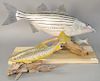 Two Gallagher carved and painted fish sculptures, brown trout, and a bass eating a fish, length 27 in.