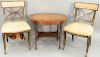 Four piece lot to include a pair of black stenciled side chairs with upholstered seats (as is), burl coffee table and a leather arm chair, coffee tabl
