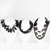 Group of Four Miscellaneous Black Beaded Necklaces