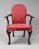 IMPORTANT QUEEN ANNE LOW BACK UPHOLSTERED MAHOGANY OPEN ARMCHAIR
, Probably New York, 1745-1760

