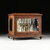A LATE VICTORIAN CARVED WALNUT AND BEVELED GLASS TANTALUS, LATE 19TH/EARLY 20TH CENTURY,