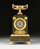 A RESTAURATION GILT AND GREEN PATINATED BRONZE MANTLE CLOCK, 1820s,