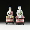 A PAIR OF FAMILLE ROSE PARCEL GILT ENAMELED BUDDHA FIGURINES, ATTRIBUTED TO THE LATE QING DYNASTY (1644-1912),
