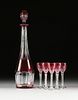 A NINE PIECE FRENCH CRANBERRY CUT TO CLEAR CRYSTAL LIQUEUR SET, VAL ST LAMBERT, BACCARAT,  MARKED, 20TH CENTURY,