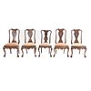 Lote de 5 sillas. Siglo XX. Estilo Chippendale. En talla de madera. Una con diseño diferente. Con respaldos semiabiertos,...