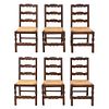 Lot of 6 chairs. France. 20th Century. Oak. Semi-open backrests and woven palm seats.