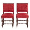 Pair of chairs. France. 20th Century. Carved in oak. Closed backrests and seats upholstered in red.