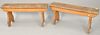 Pair of primitive style benches. ht. 17 in., wd. 36 in. Provenance: Former home of Mel Gibson, Old Mill Rd, Greenwich, CT