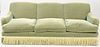 Large mohair upholstered three cushion sofa. ht. 35 in., lg. 94 in., dp. 42 in. Provenance: Former home of Mel Gibson, Old Mill Rd, Greenwich, CT