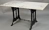 Iron base table with rectangle marble top. ht. 28 in., top: 29" x 54".Provenance: Former home of Mel Gibson, Old Mill Rd, Greenwich, CT