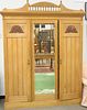 Three door pine armoire, having fitted drawers. ht. 91 in., wd. 68 in.