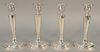 Set of four Gorham sterling silver candlesticks, weighted. ht. 9 in.