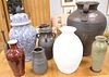 Group of fourteen pieces to include ceramic, pottery and metal vases and pots. tallest 24 1/2 in.