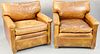 Pair of brown leather easy chairs. ht. 31 in., wd. 32 in., dp. 37 in. Provenance: Former home of Mel Gibson, Old Mill Rd, Greenwich, CT