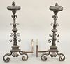 Pair of tall iron andirons. ht. 39 in. Provenance: Former home of Mel Gibson, Old Mill Rd, Greenwich, CT