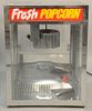 Commercial grade stainless steel popcorn machine, Pop-N-Serve, server product, 14 or 16 oz. ht. 26 1/2 in., wd. 20 in. Provenance: Former home of Mel 