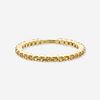 Yellow sapphire and gold eternity band