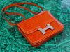 Hermes Shiny Orange Alligator Micro Mini Constance