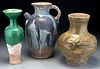 (3) Large ancient ceramic vessels.