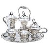 Tea and Coffee Set. Mexico. 20th Century. VILLA Sterling Silver 0.925. Design with chiseled handles and vegetable motif.
