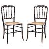Pair of Chairs. England. Ca. 1900. VICTORIAN Style. Ebonized wood with mother-of-pearl incrustations.