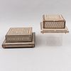 Lote de cigarreras. Marruecos, siglo XX. Elaboradas en madera tallada con aplicación de taraceado y cajas musicales. Pz: 2