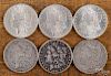 Six Morgan silver dollars, to include two 1884 O, UNC, an 1891, AU, an 1892 S, VG, and two 1894 O