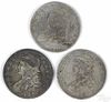 Three Cap Bust silver half dollars, to include an 1818, G-VG, and two 1819, G-VG.