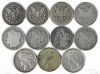 Eleven assorted silver dollars, to include Morgan and Peace dollars, lower grade.