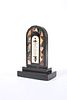 A VICTORIAN ASHFORD BLACK MARBLE AND PIETRA DURA DESK THERMOMETER, with arc