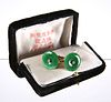 A PAIR OF CHINESE JADE AND DIAMOND CUFFLINKS, the round jade disc centred b