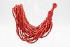 A CORAL BEAD NECKLACE, of multi strands of coral beads. Length 49cm.