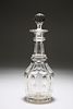 A CUT-GLASS BARREL-SHAPED DECANTER, with faceted ball stopper over a panel-