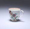 A WORCESTER POLYCHROME FLORAL PAINTED COFFEE CUP, c. 1770, painted with gil