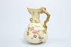 A ROYAL WORCESTER BLUSH IVORY JUG, 1891, with gilded coral-moulded handle, 