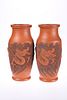 A PAIR OF JAPANESE TERRACOTTA VASES DECORATED WITH DRAGONS, of hipped balus