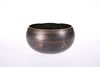 AN ISLAMIC COPPER TUMBLER BOWL, probably 19th Century, with good original p