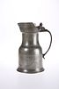 A LATE 18TH CENTURY PEWTER LIDDED FLAGON, probably French, stamped to base 
