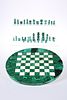 A MALACHITE CHESS SET, the circular board with white-metal stringing and iv