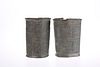 TWO BENIN BRONZE ARMLETS, of cylindrical form. 14.5cm high