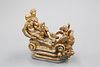 A 19TH CENTURY CARVED AND PARCEL-GILT GROUP, of two figures in a sleigh hol