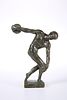 AFTER THE ANTIQUE, A BRONZE FIGURE OF A DISCUS THROWER, with green patina. 