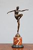A BRONZE FIGURE OF A DANCER, IN ART DECO STYLE, posing with arms outstretch