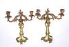 A PAIR OF CONTINENTAL GILT-BRONZE AND PORCELAIN TWIN-LIGHT CANDELABRA, LATE