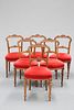 A SET OF SIX VICTORIAN WALNUT PARLOUR CHAIRS, each with carved and pierced 
