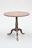 AN 18TH CENTURY OAK TILT-TOP TRIPOD TABLE, with circular top and baluster s