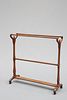A 19TH CENTURY MAHOGANY COUNTRY HOUSE TOWEL RAIL, with urn-topped uprights 