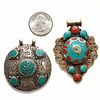 PAIR, TIBETAN SILVER WITH INSET TURQUOISE PENDANTS