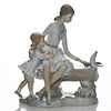 LLADRO NAO FIGURINE, MOTHER AND CHILD ON BENCH WITH BIRDS