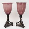 Pair of Amethyst Glass Hurricane Shades on Ebonized and Parcel-Gilt Stands
